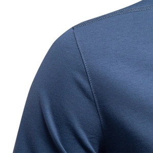 Deep blue Henley shirt featuring detailed shoulder stitching and premium knit fabric texture