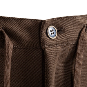 Men's dark brown casual trousers featuring textured button and woven drawstring waist