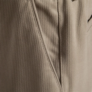 Men's brown casual business pants featuring premium corduroy texture and precise stitching