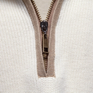 Men's white knit sweater with half-zip stand collar and vintage metal zipper details