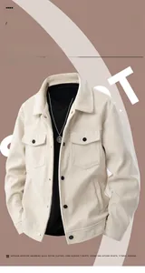 Detail of corduroy texture and flap pockets on a cream vintage utility jacket