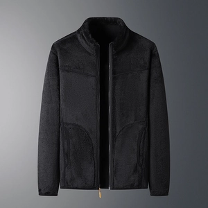 Close-up of the black fleece texture and metal zipper on this warm unisex winter jacket