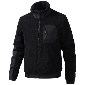 Schwarze Teddy-Fleecejacke mit Stehkragen, Reißverschlusstasche und Materialmix
