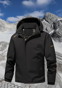 Detail view of black windproof outdoor jacket with hooded thermal multi-layer insulation
