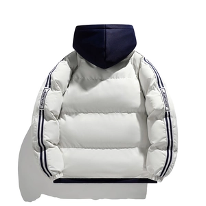Detail of blue and white quilted padded jacket with JWEES sleeve branding and hood
