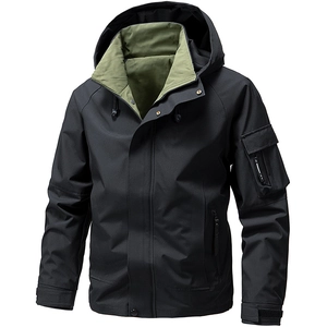 Men's waterproof hooded outdoor jacket in matte black with green lining and utility pockets