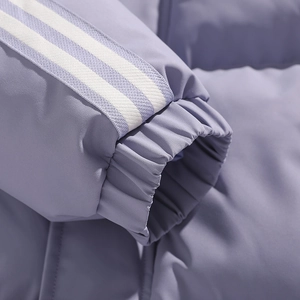 Detail of lavender padded jacket sleeve with windproof elastic cuffs and white stripes