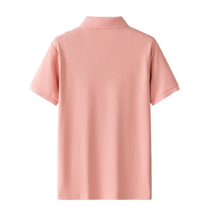 Detail view of the back of a pink cotton polo shirt featuring a classic ribbed collar design