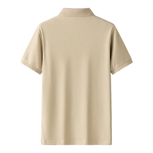 Rear view of a classic beige short sleeve polo shirt with standard collar and flat hem