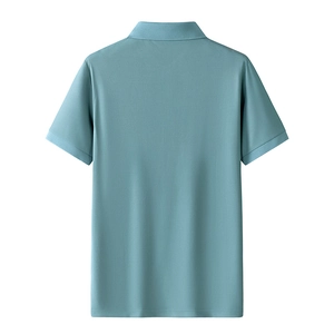 Detail view of the back of a grey-blue short-sleeved polo shirt with crisp shoulder seams