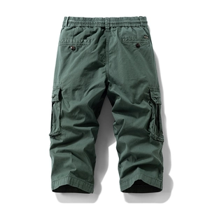 Detailed back view of olive green cargo pants with elastic waist and buttoned pockets
