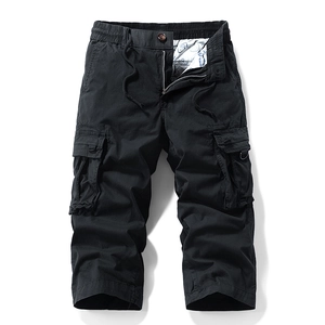 Men's black multi-pocket cargo cropped pants with elastic drawstring waist and flat lay design