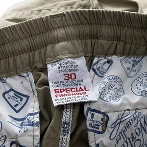 Macro detail of men cargo pants waist with cotton spandex fabric and premium lining