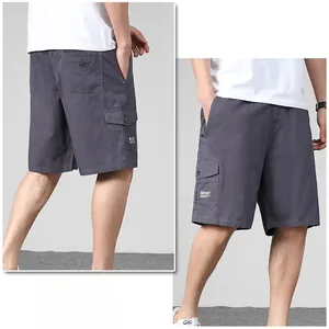 Detail view of cotton cargo shorts showing side flap pockets and twill fabric texture