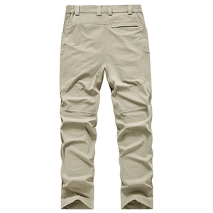 Men's khaki stretch tactical pants featuring a flexible elastic waist and multi-pocket cargo design