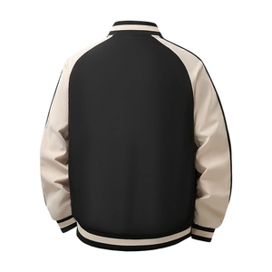 Vue arrière du blouson bomber bicolore noir et crème avec finitions rayées aux bords