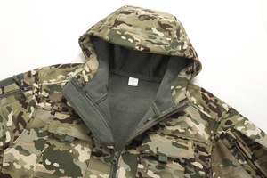 Detail view of camouflage tactical jacket showing fleece lining and inner size label