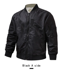 Detailed view of black MA-1 bomber jacket with ribbed collar and tactical sleeve pocket