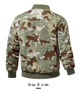 Rear view of a camouflage bomber jacket with green ribbed cuffs and hem, gray B side