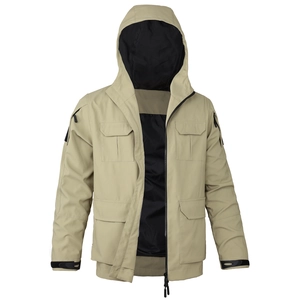 Detail of khaki tactical hooded jacket featuring cargo pockets and adjustable cuffs