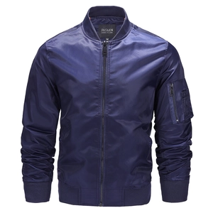 Detailed view of navy blue satin bomber jacket with sleeve pocket and ribbed cuffs