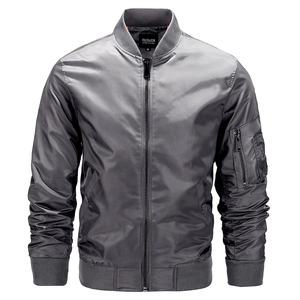 Close-up of silver-gray bomber jacket showing nylon sheen, ribbed collar and zipper pocket