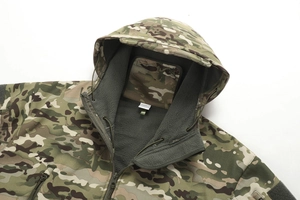 Detail of camouflage jacket with warm green fleece lining and adjustable hood drawstring