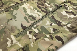 Close-up of Multicam tactical jacket with high-quality waterproof zipper and camouflage fabric