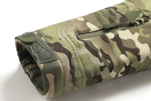Close-up of tactical jacket sleeve featuring MultiCam pattern and adjustable velcro cuffs
