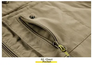 Detail of khaki outdoor vest showing a zippered chest pocket with green pull cord