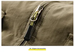 Detail of durable outdoor vest featuring high-quality zippers with woven pull cords