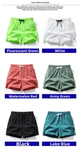 Flat lay of quick-dry athletic shorts for men in six bright colors with drawstring waist