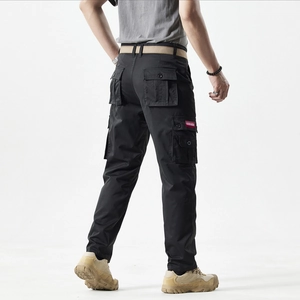 Detailed back view of men's black multi-pocket cargo pants with khaki woven belt design