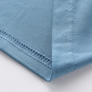 Close-up of light blue ice silk polo shirt with reinforced double stitching and mesh fabric