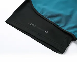 Detail view of quick-dry running shorts with KEFRTRAINING logo and flatlock stitching