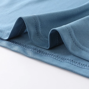 Detailed close-up of quick-dry ice silk fabric texture and fine stitching on a men's polo shirt