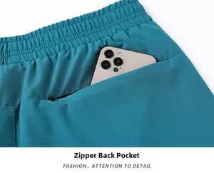 Detail of running shorts with a hidden back zipper pocket holding a smartphone