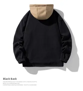 Detail of corduroy hooded jacket back with elastic cuffs and black contrast design