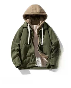 Detail of army green corduroy jacket with faux shearling lining and khaki hood