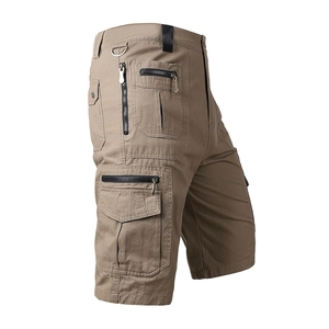 Men's khaki multi-pocket cargo shorts in loose fit made from durable cotton fabric