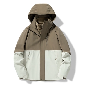 Men's outdoor hooded jacket featuring khaki and cream color-blocking and adjustable cuffs