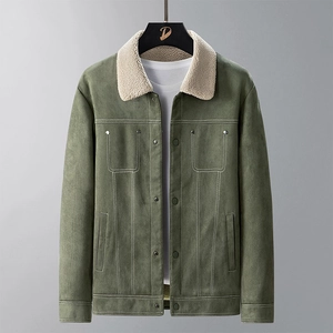 Close-up of olive green suede jacket with warm beige sherpa collar and metal studs