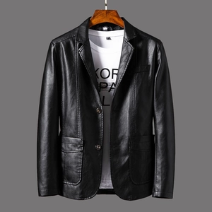 Detailed view of black PU leather blazer featuring two buttons and classic flap pockets