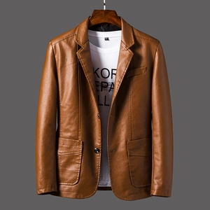 Detailed close-up of brown PU leather blazer featuring notched lapels and large patch pockets