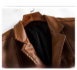 Detailed close-up of brown PU leather jacket with premium stitching and lapel texture