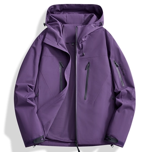 Detail of purple waterproof jacket showing zip pockets and breathable mesh lining
