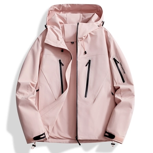 Detail of light pink waterproof hiking jacket with functional zippers and mesh lining
