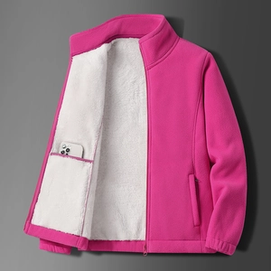 Detail of warm rose red fleece jacket with white sherpa lining and interior phone pocket