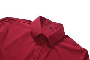 Close-up of wine red men's dress shirt collar with stitching detail and size tag