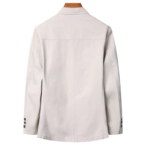 Detail view of cotton suit back with shoulder seam and three-button cuffs in cream